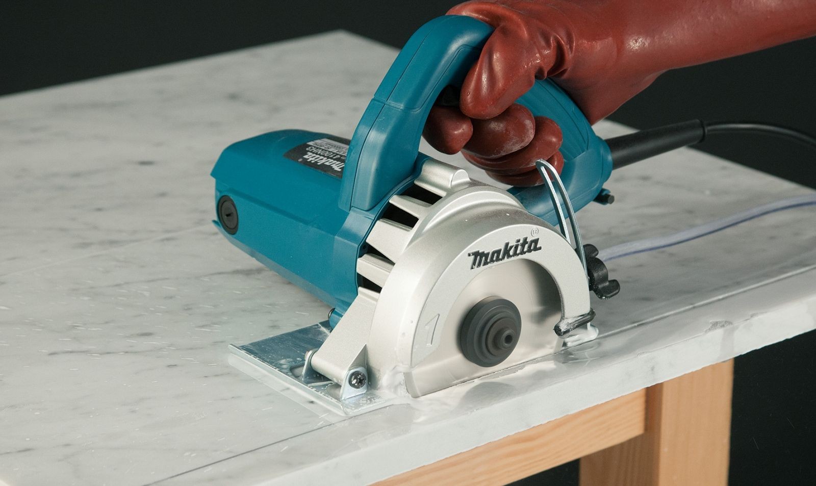 Máy cắt gạch đá Makita 4100NH3 1200W đĩa 110 mm